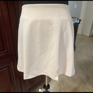 Forever 21 size 9 BLUSH skirt! Silk lining inside! Mini!  Brand New!